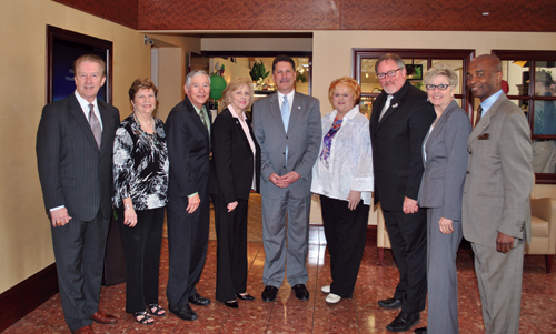 NAR’s Jamie Gregory (center) is joined in the HAR lobby by Federal Political Coordinators Jim Cockrill, Marilyn Burt, John Nichols, Delora Wilkinson, Nancy Furst, Danny Frank, Vicki Fullerton, and Gerald Womack.