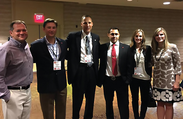 (l-r) Ed Hrebenar, CCIM; Edward Bovermann, CCIM; Mike Boudousquie, CCIM; Adrian Ramirez, CCIM; Jeanie Gibbs, CCIM; and Jane Nodskov, CCIM