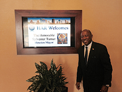 Mayor Turner was amused to see his image and HAR’s welcome message prominently displayed in the HAR lobby.