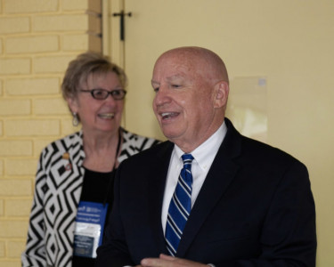 House Ways & Means Committee Chairman Kevin Brady gave an update at HAR’s Tortilla Coast Breakfast. Behind him is FPC Vicki Fullerton.